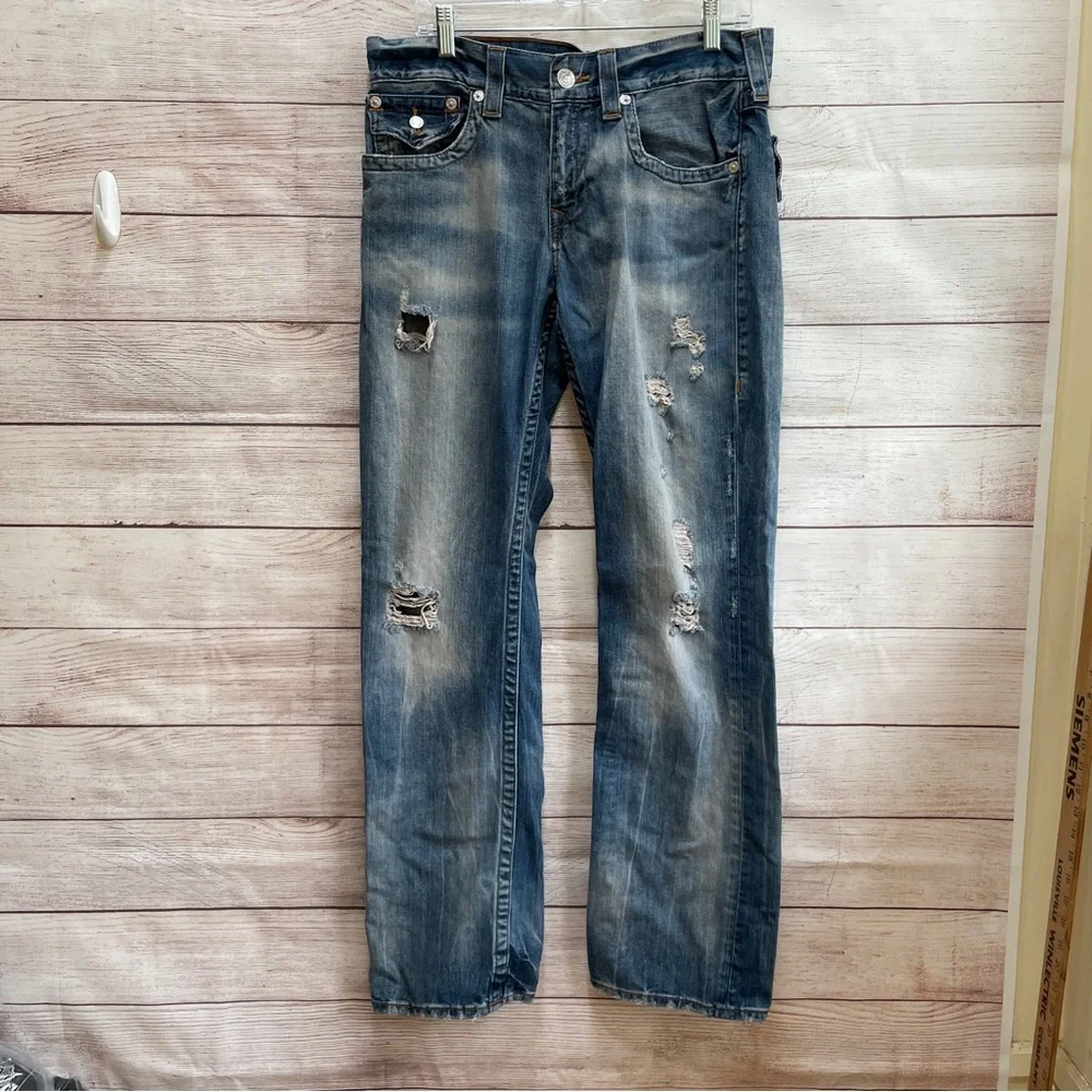 TRUE RELIGION STRAIGHT FLAP DISTRESSED JEANS‎